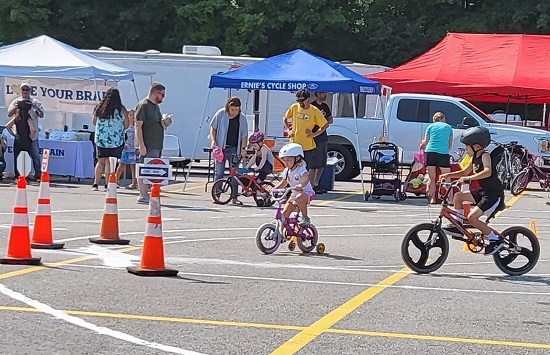 John conducts the Bike Rodeo at the 2022 Kids Safety Day