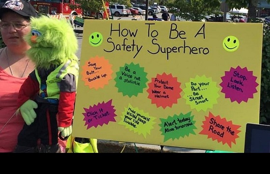 Poster of Kim and "Walnut" with "How to Be a Safety Superhero" poster